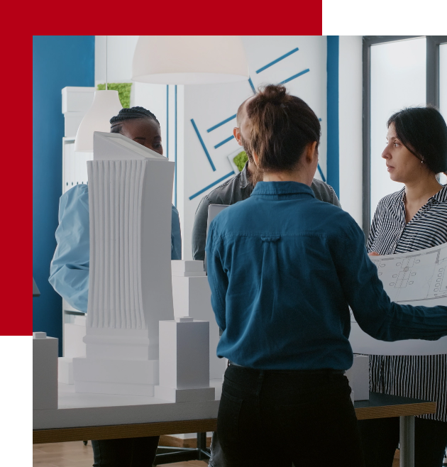 group-diverse-people-working-design-building-model-with-laptop-blueprints-multi-ethnic-colleagues-using-technology-construction-layout-plan-architectu