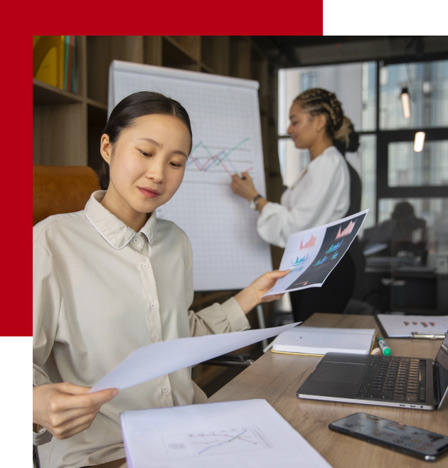 office workers using finance graph