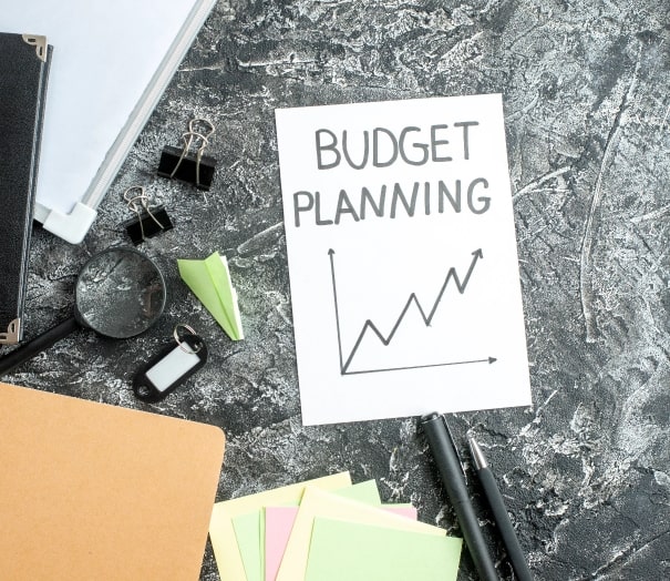 top-view-budget-planning-note-with-pens-gray-surface-job-copybook-school-student-business-work-college-money-budget-min