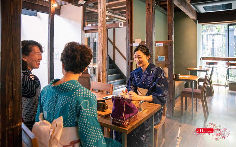 Asian family at relaxing cafe